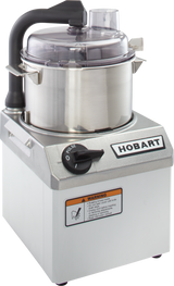 A stainless steel Hobart food processor featuring a 4 qt bowl, clear plastic lid, black handle, and a control knob labeled OFF and PULSE. A warning label appears on the front panel, with the HOBART brand name displayed prominently.