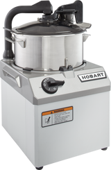 A commercial Hobart Food Processor with a 6 qt. stainless steel bowl, COOLCUTTER knives, black handle, locking lid, and control dial. The machine features a caution label and prominent Hobart logo, ideal for professional kitchen food preparation.
