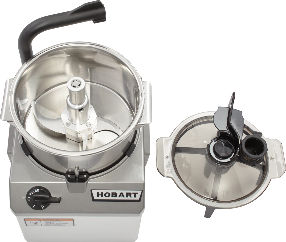 Top-down view of a silver Hobart Food Processor with its COOLCUTTER knives visible inside the 6 qt. bowl. The bowl is open, and the transparent plastic lid with black handles and feed tubes is placed to the right of the machine.