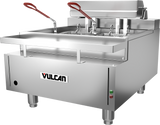 A large Vulcan CEF75 electric countertop fryer with two red-handled baskets and control buttons sits on four sturdy legs. With a 75 lbs oil capacity, it’s ideal for heavy-duty use in any busy restaurant kitchen.