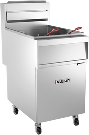 A Vulcan 1GR85M commercial gas fryer with a stainless steel exterior, two red-handled wire fry baskets in the open fry tank, and four caster wheels for mobility. The Vulcan logo is on the front panel. This fryer is clean and unused.
