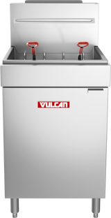 A commercial stainless steel gas fryer with a 65-70 lb capacity, featuring the Vulcan brand in red and white on the front, two red-handled baskets inside, a partially closed lid, and standing sturdily on four legs.