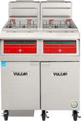 A Vulcan stainless steel high efficiency gas fryer with dual 50 lbs. capacity compartments, red control panels, four fryer baskets with red handles, caster wheels for mobility, certification stickers, and two cabinet doors below.