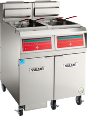 A high efficiency Vulcan gas fryer with 50 lbs. capacity, featuring dual baskets, digital controls, and a stainless steel exterior. It stands on wheels with two lower storage cabinets and certification badges on the bottom right.