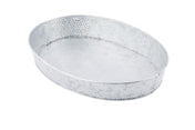 A large, oval-shaped, silver metal tray with a hammered texture, this TableCraft GP129 oval steel platter features slightly raised edges and a shiny, reflective surface. Shown empty against a white background.