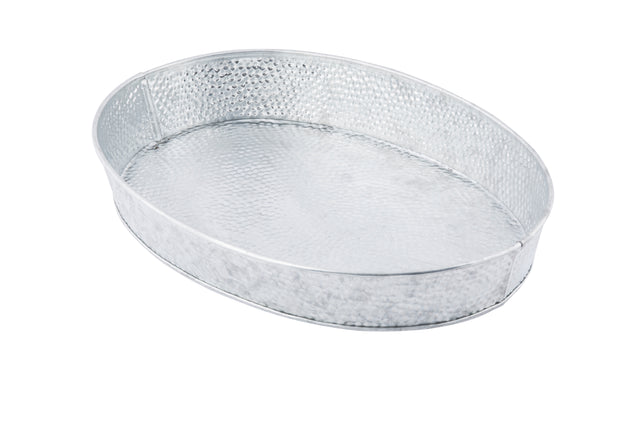 A large, oval-shaped, silver metal tray with a hammered texture, this TableCraft GP129 oval steel platter features slightly raised edges and a shiny, reflective surface. Shown empty against a white background.