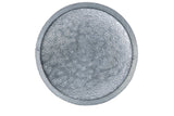 A round, metallic TableCraft tray with a raised, hammered texture and slight lip around the edge. Crafted from galvanized steel, its surface features small, uneven indentations for a reflective, patterned look. The background is plain white.