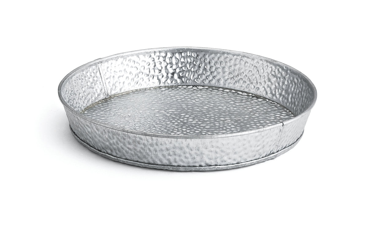 A round, shallow steel dinner platter with a hammered texture and raised edges, shown on a white background. The tray features a silvery finish and simple, industrial design—ideal for stylish presentation.