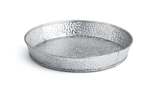 A round, shallow steel dinner platter with a hammered texture and raised edges, shown on a white background. The tray features a silvery finish and simple, industrial design—ideal for stylish presentation.