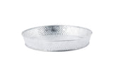 A round, shallow steel dinner platter with a hammered texture and a slightly raised edge. The tray has a shiny, silver finish and a simple, minimalist design. It is empty and placed against a plain white background.