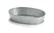 A shallow, oval-shaped TableCraft GP96 hammered metal tray with a silver finish. This galvanized dinner platter features slightly raised sides and a textured, dimpled surface, placed on a white background.