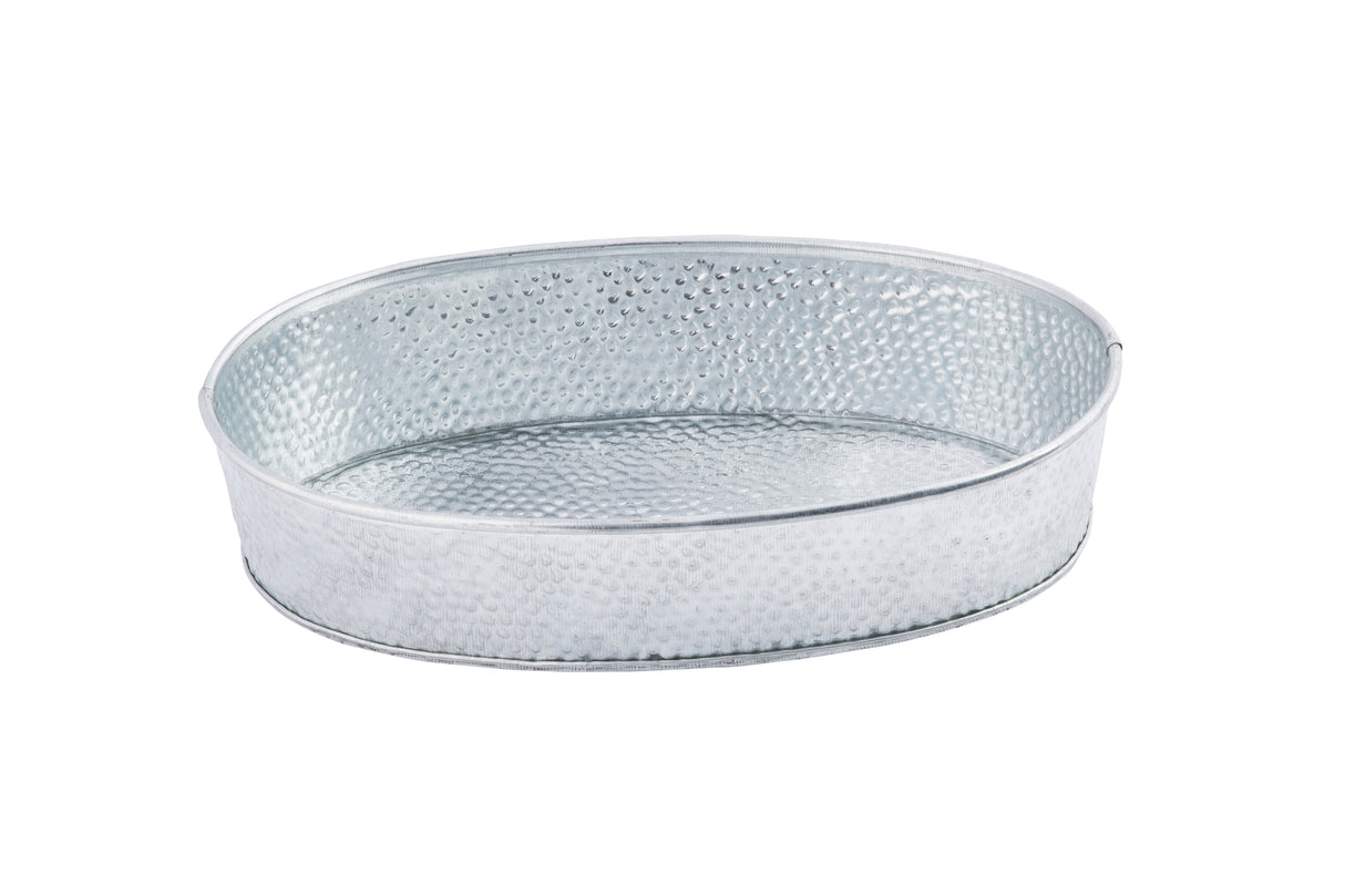 A shallow, oval-shaped galvanized dinner platter with a hammered texture. The tray has low, slightly flared sides and a smooth rim. It is photographed against a plain white background.