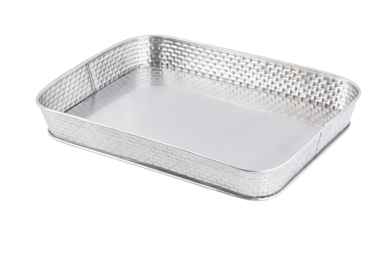 A rectangular stainless steel serving platter from the Brickhouse Collection, featuring slightly raised, woven-textured sides and a smooth, reflective base. The rounded edges complete its elegant look against a white background.