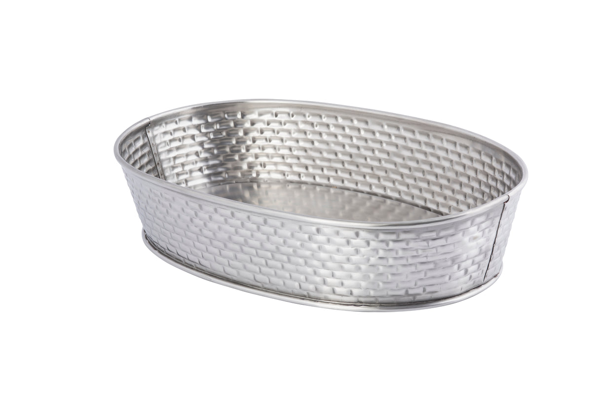 A silver, oval-shaped metal basket with a woven texture and slightly flared sides serves as a stylish stainless steel serving platter. It features a smooth rim and is empty, set against a white background with no additional objects present.