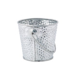A small, round, silver galvanized pail with a hammered texture and a thin wire handle attached at the sides. The bucket is empty and displayed against a white background.