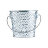 A small, metallic, hammered galvanized steel pail with a textured, dimpled surface and a curved handle, shown against a white background. The bucket appears empty and slightly reflective—ideal for TableCraft Products displays.