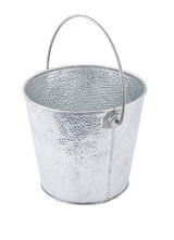 A small, empty, round TableCraft steel pail with a hammered texture and curved handles attached near the rim, isolated on a white background.