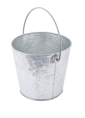 A small, empty, round TableCraft steel pail with a hammered texture and curved handles attached near the rim, isolated on a white background.