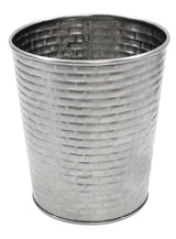 A shiny, silver metal wastebasket with a slightly flared top and a woven basket-like textured pattern, reminiscent of the sleek look of a Brickhouse Collection stainless steel cup, is shown against a white background with its smooth metallic interior visible.