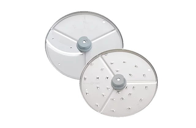 Two round, metallic food processor discs for the Robot Coupe R101P are shown. Each features a central gray plastic hub; one is smooth, the other has holes for slicing or grating with the vegetable prep function. Both have a shiny, reflective finish.
