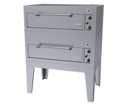 A double-deck commercial bake oven with a stainless steel finish. Each deck has a horizontal handle, rectangular door, and control knobs on the right. The electric deck oven stands on four sturdy legs, with the “Garland” brand visible on both doors.