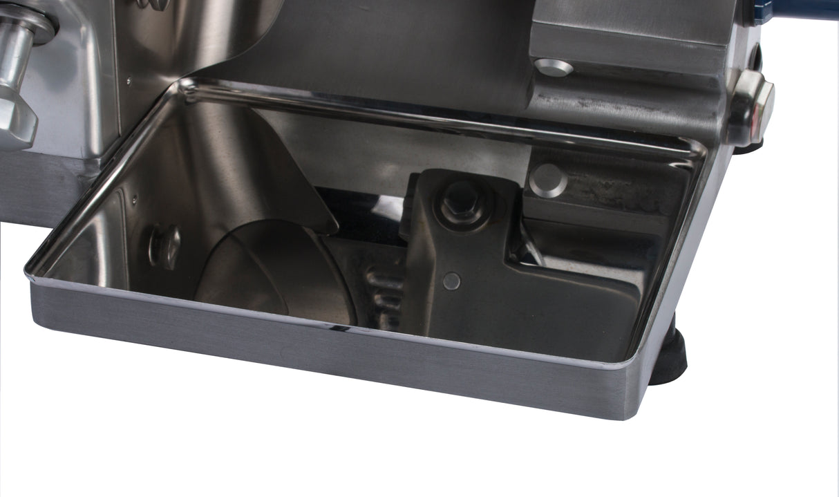 Close-up of a stainless steel tray attached to the compact Globe GC512 slicer, reflecting surrounding bolts and mechanism components. Its clean, polished surface highlights the durability of this Chefmate Series commercial machine.