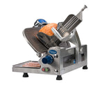 A Chefmate Series stainless steel compact slicer with a blue logo holds a loaf of deli meat, partially sliced. Several thin, evenly cut slices rest on the tray below, and the 12 inch slicer features dials and safety guards.
