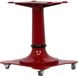 A sturdy red metal mobile pedestal base with a flared, cylindrical central column and a wide, four-pointed foundation. Four small caster wheels at each end provide easy mobility. The tabletop is not attached. Ideal as an artisanal slicer stand.