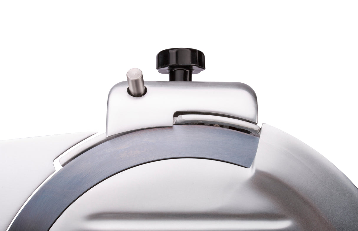 Close-up photo of a Globe G12 12" manual slicer, highlighting the sharp circular blade partially covered by a metal guard. A black adjustment knob and silver control lever are visible on top against a white background.