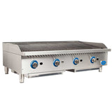 A stainless steel countertop charbroiler gas grill with four control knobs featuring blue accents, two grease trays underneath, and heavy duty cast-iron grates. Raised sides and back offer splatter protection, and it stands on four short legs.