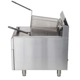 A commercial stainless steel gas countertop fryer with a wire basket and black handles; the basket is tilted above the oil, and the fryer, featuring a 30-lbs fat capacity, stands on four legs against a plain white background.