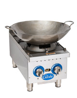 A large steel wok with handles sits on a stainless steel gas countertop burner. The burner, labeled “Globe,” features two blue control knobs and powerful cast iron burners. A plain white background highlights the cooking equipment.