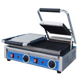 A countertop electric grill, this commercial panini press features cast iron grooved plates, a blue control panel, two red switches, and black dials. The stainless steel handle and raised top plate reveal the lower cooking surface.