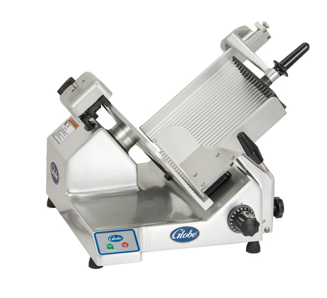 A commercial-grade Heavy Duty Slicer with a slanted stainless steel body, 13” steel knife partially covered by a blade guard, thickness adjustment dial, food carriage with handle, and control buttons, branded “Globe” on the base.