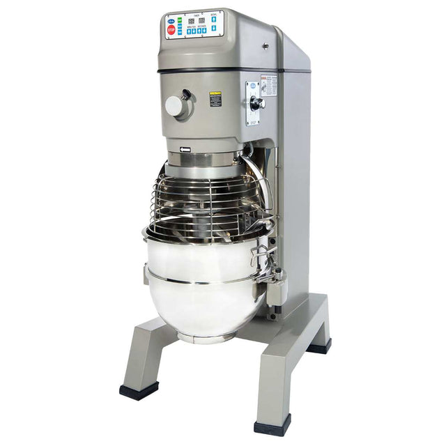 A large commercial planetary pizza mixer with a 60 qt stainless steel bowl, metal safety guard, and digital control panel on top. This gray, sturdy mixer is designed for heavy-duty use in kitchens or bakeries.