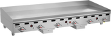 A large Vulcan 972RX_LP countertop gas griddle with six control knobs, a flat cooking surface, and short legs. This heavy duty griddle features a sturdy stainless steel design, perfect for demanding commercial kitchen use.
