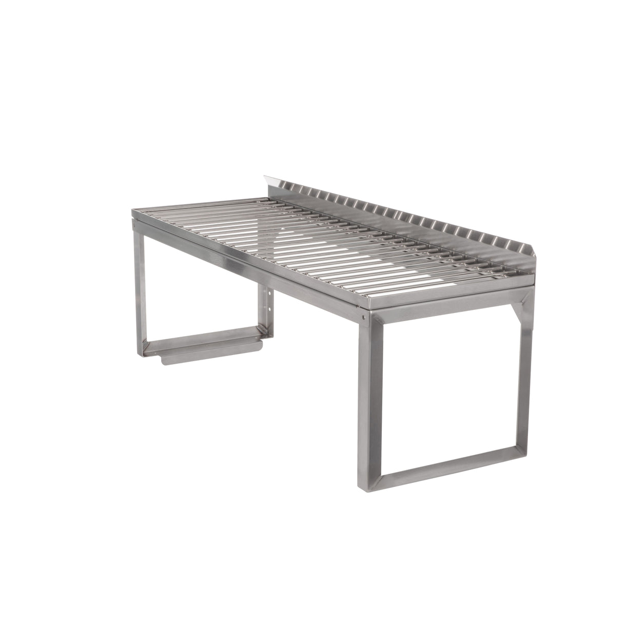 A stainless steel grill grate with foldable legs, a raised back edge, and an open, minimalist structure. This Vulcan-inspired design features parallel metal bars and is ideal as a removable wire rack for outdoor cooking or barbecuing over a fire pit.