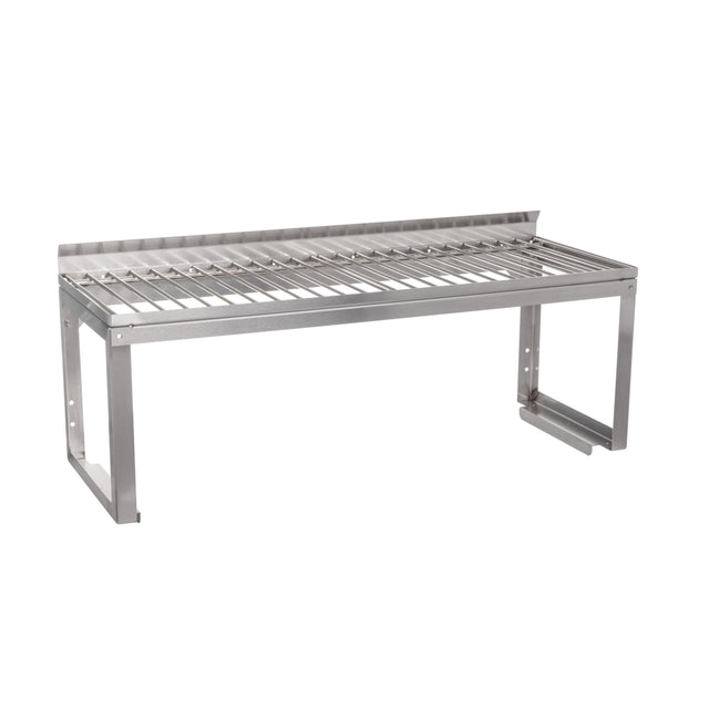 A Vulcan stainless steel wall-mounted overshelf with a slatted design features horizontal bars as the shelf surface, a raised back edge, and rectangular legs with mounting brackets; includes an optional removable wire rack for added versatility.