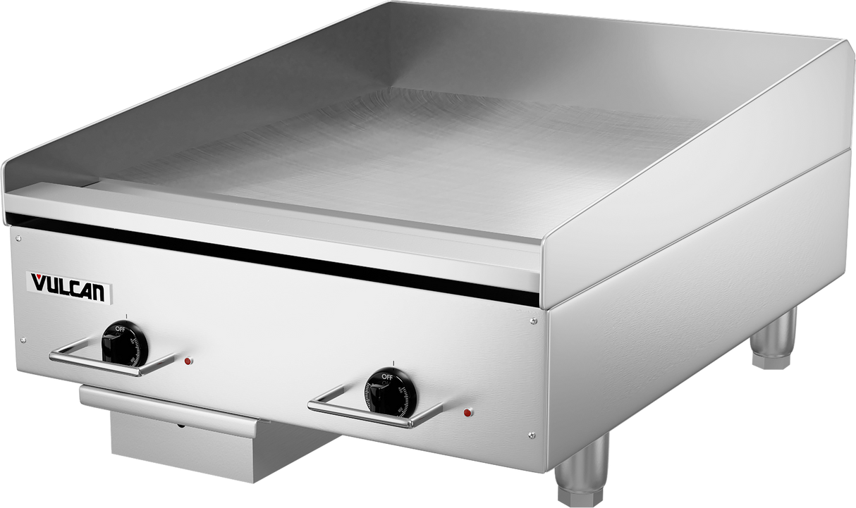 A sleek, industrial countertop griddle with a smooth stainless steel cooking surface, two control knobs, a front-facing grease drawer, and sturdy legs. The heavy duty electric griddle by Vulcan features reliable performance and professional design.