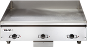 A heavy duty, 36 inch electric countertop griddle with three “OFF” control knobs, a flat cooking surface, a raised backsplash, and a front-facing panel featuring the “Vulcan” brand logo on the left side.