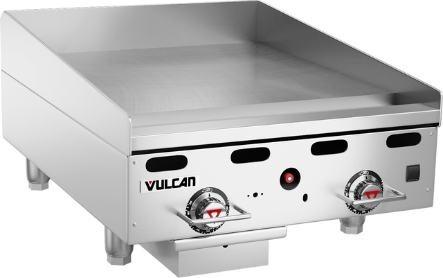 A heavy duty Vulcan 24" gas countertop griddle with two control knobs, a flat stainless steel cooking surface, short legs, and a grease tray underneath. The front panel displays the Vulcan logo and indicator lights.
