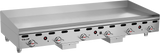 A large Vulcan 72 inch heavy duty griddle with six control knobs and indicator lights on the front. This stainless steel countertop gas griddle features a clean flat cooking surface, surrounded by a backsplash on the back and sides.