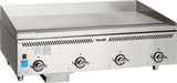 A Vulcan Heavy Duty Griddle with three temperature control knobs, a flat cooking surface, and a blue energy certification sticker. This countertop gas griddle features durable stainless steel construction and advanced infrared burner technology for even heating.