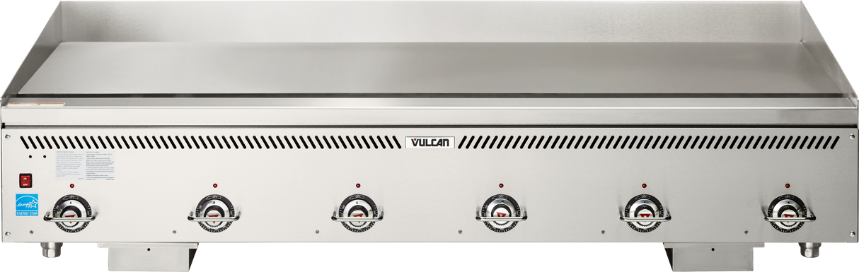 A large commercial Heavy Duty Griddle with five black control knobs, a red power switch, ventilation slots, and a Vulcan brand label. The flat chrome plate surface is spacious and perfect for high-volume cooking.