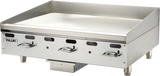 A 36 inch Vulcan stainless steel commercial countertop griddle with three control knobs, raised side and back splashes, short legs, and a flat cooking surface, designed for cooking large quantities of food in restaurant kitchens.