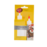 A Chef Squeeze Bottle Set in yellow TableCraft packaging features two clear, dishwasher safe bottles with red and white caps, perfect for drizzling sauces and condiments over desserts.