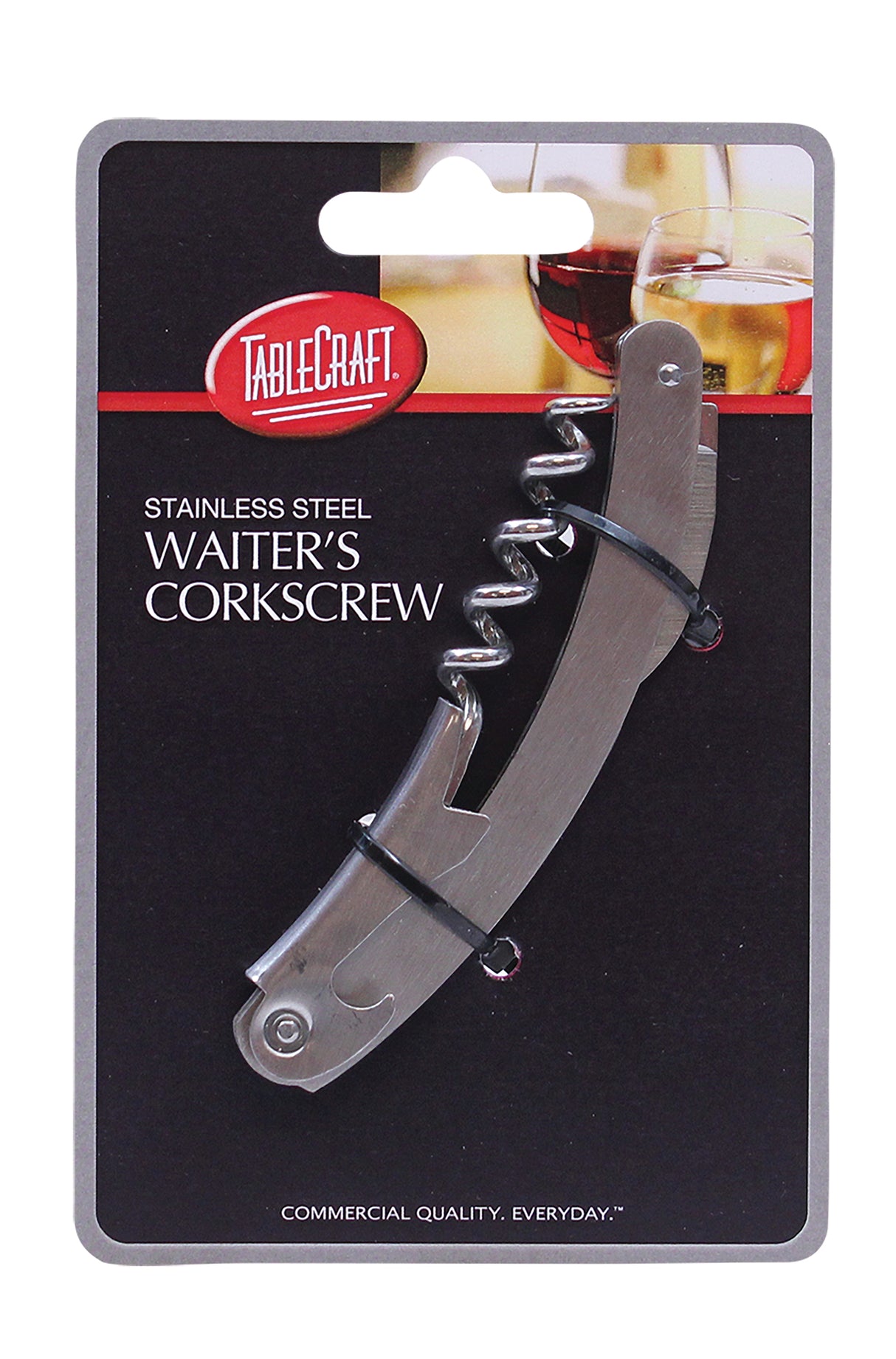 A stainless steel corkscrew is displayed on black TableCraft packaging featuring wine glasses. Text reads “STAINLESS STEEL WAITER'S CORKSCREW.” The waiter's corkscrew is secured with plastic ties.