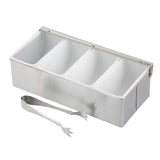 A stainless steel bar caddy set with 4 compartments and a hinged lid sits on a white background. In front of the caddy are small metal tongs designed for picking up items from the compartments.