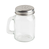 A clear glass Mason salt shaker jar with a handle and a silver metal lid featuring multiple small holes, resembling a pepper shaker. The jar is empty and set against a plain white background.