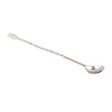 A stainless steel bar mixing spoon with a small fork on one end and a shallow spoon on the other; its handle features a twisted spiral design. The utensil is set against a white background.